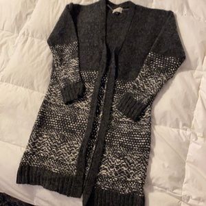 Long black and white open front cardigan